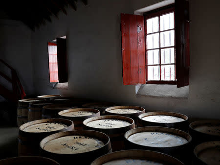 Whisky barrels are stored at the Benromach Distillery in Forres, Moray, Scotland, Britain May 18, 2017. Picture taken May 18, 2017. REUTERS/Russell Cheyne