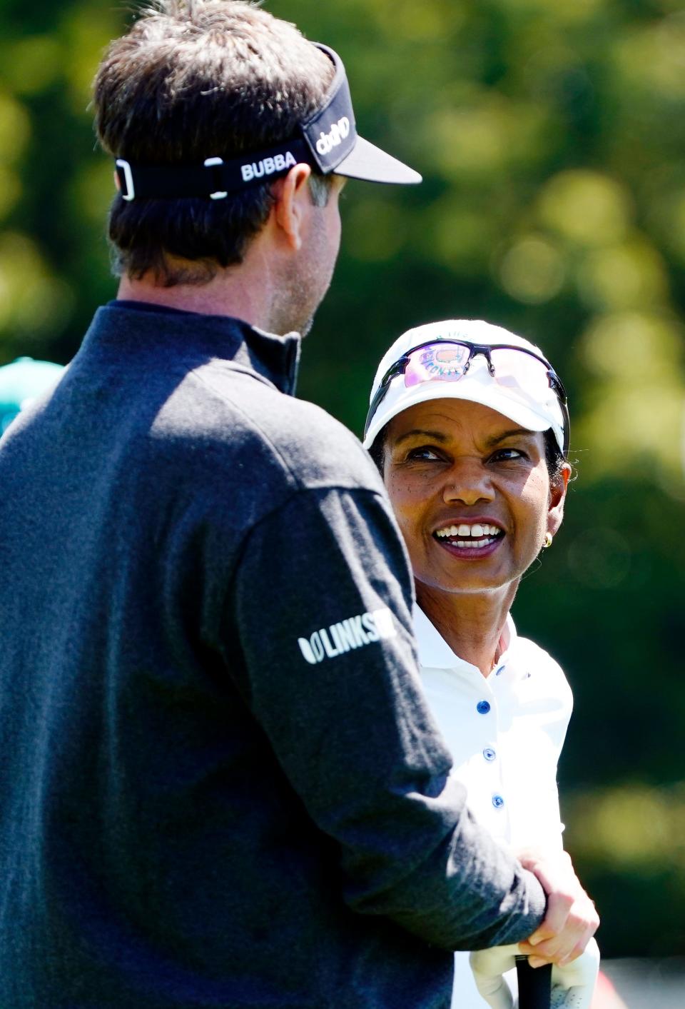 Apr 3, 2022; Augusta, Georgia, USA; Bubba Watson and Condoleezza Rice wait to tee off on no. 1 following the Drive, Chip & Putt Finals at Augusta National Golf Club.