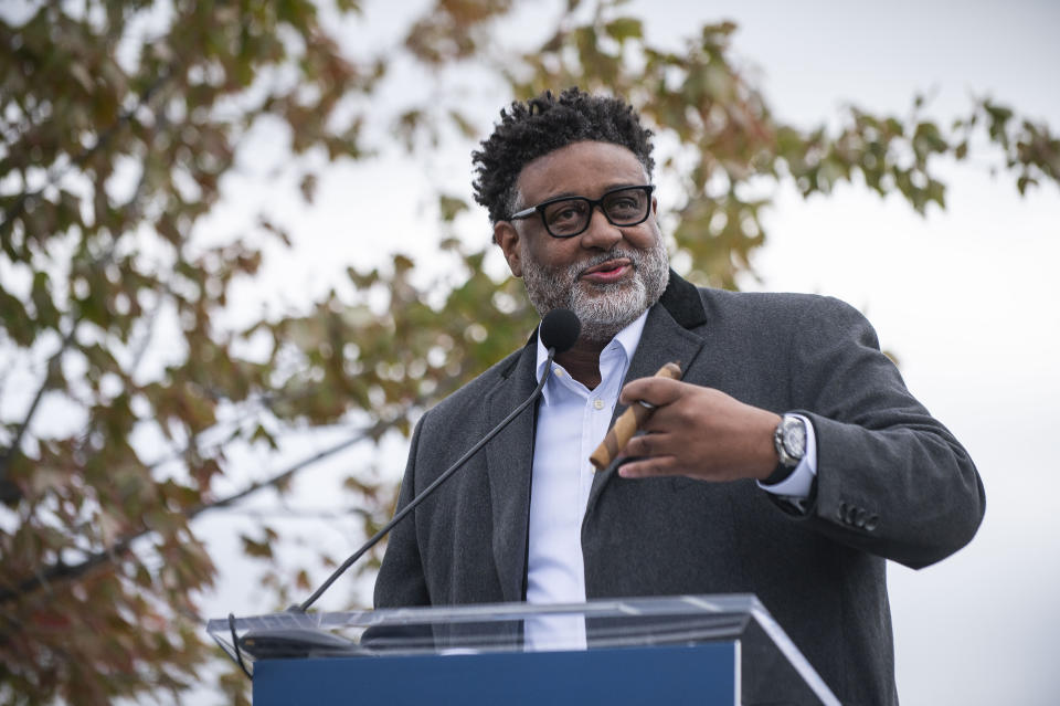 Detroit Riverfront Conservancy CFO William Smith addresses a large crowd before a ribbon cutting ceremony marking the official opening of the Uniroyal Promenade along the Detroit Riverwalk on Saturday, Oct. 21, 2023 in Detroit. Authorities have charged Smith, with embezzling millions of dollars from a group that has turned Detroit’s riverfront into a popular attraction. William Smith was chief financial officer at the Detroit Riverfront Conservancy until he was recently fired. Federal prosecutors say he used the group's money for travel, hotels, limousines, household goods, clothing and jewelry. (Katy Kildee/Detroit News via AP)