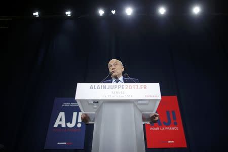 French politician Alain Juppe, current mayor of Bordeaux, a member of the conservative Les Republicains political party and candidate for the centre-right presidential primary, attends a rally as he campaigns in Rennes, France, October 19, 2016. REUTERS/Stephane Mahe