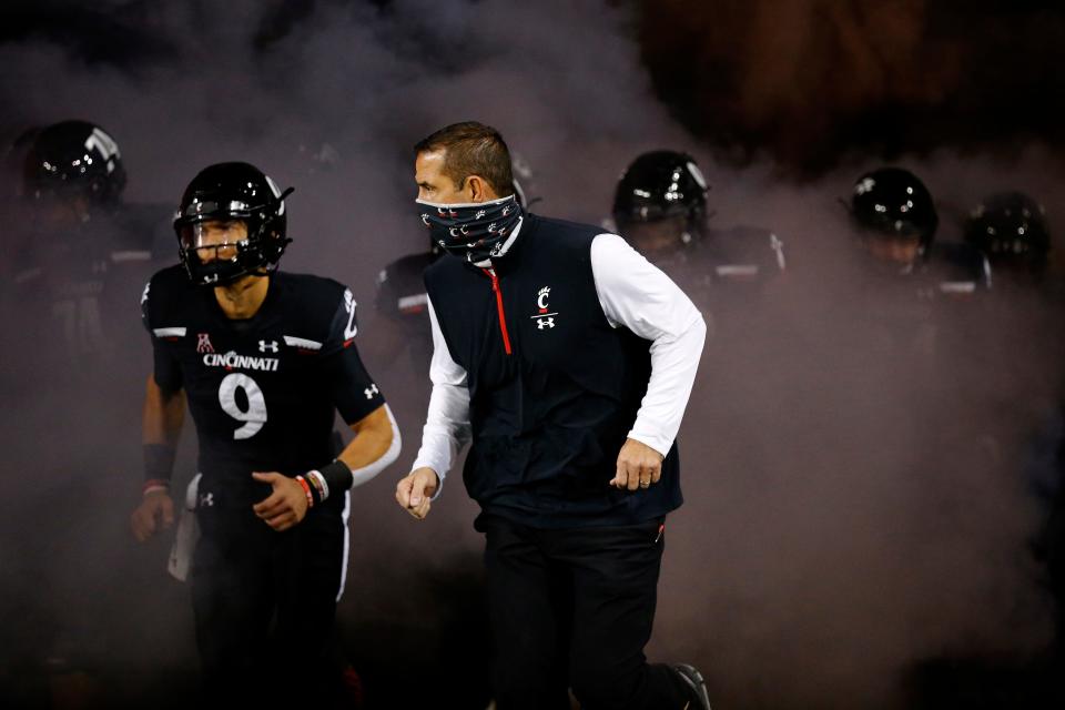 Cincinnati coach Luke Fickell and quarterback Desmond Ridder.