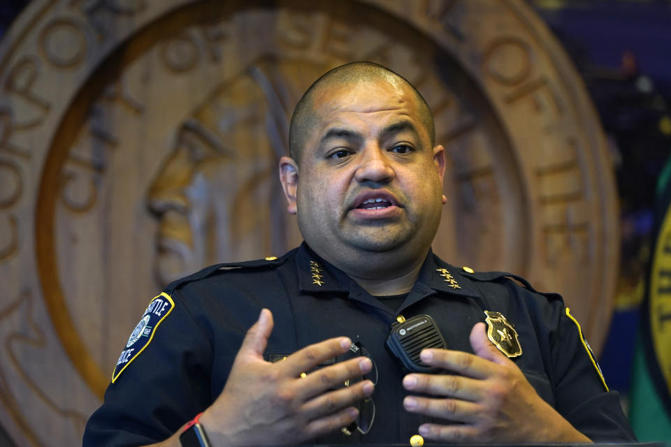 FILE - In this Sept. 2, 2020, file photo, then-Interim Seattle Police Chief Adrian Diaz addresses a news conference in Seattle. Chief Diaz on Friday, Aug. 6, 2021, fired the two Seattle police officers who violated the law while attending events in Washington D.C. during the Jan. 6 insurrection. Diaz said he fired Caitlin and Alexander Everett, the two officers who are married, effective immediately. (AP Photo/Elaine Thompson, File)