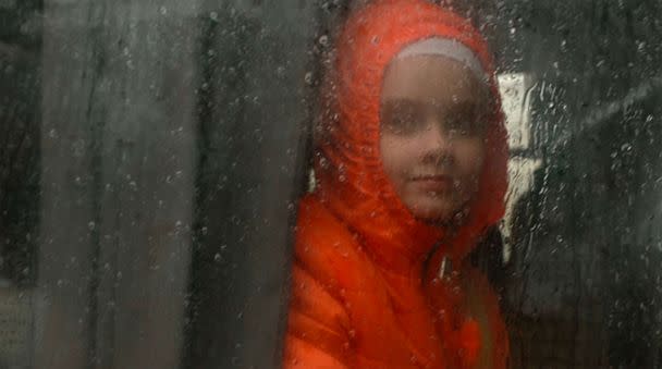 PHOTO: Zlata Ivanchenko, 9, on the bus leaving the city of Kostyantynivka, eastern Ukraine, on April 20, 2023. (Scott Munro/ABC News)