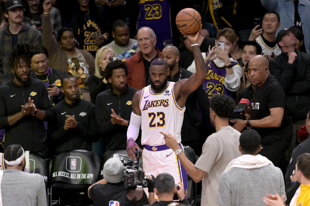 Mar 2, 2024; Los Angeles, California, USA; Los Angeles Lakers forward LeBron James (23) acknowledges the crowd after scoring his 40,000th career point against the Denver Nuggets at Crypto.com Arena. Mandatory Credit: Jayne Kamin-Oncea-USA TODAY Sports