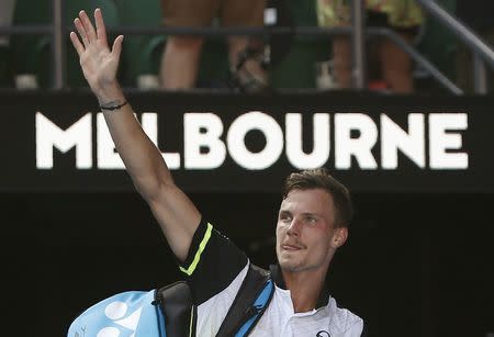 Tennis - Australian Open - Rod Laver Arena, Melbourne, Australia, January 22, 2018. Marton Fucsovics of Hungary leaves after losing against Roger Federer of Switzerland. REUTERS/Thomas Peter