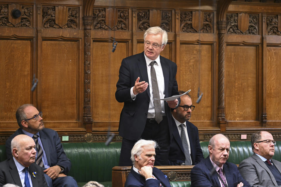 FILE - In photo issued by UK Parliament, Member of Parliament David Davis asks a question to Secretary of State for Business and Trade Kevin Hollinrake during an urgent question on the Post Office Horizon scandal, London, Jan. 10, 2024. Lawmakers trying to get to the bottom of one of Britain’s gravest injustices are questioning bosses of the Post Office and Fujitsu as momentum grew to compensate and clear the names of more than 900 Post Office branch managers wrongly convicted of theft or fraud because of the Japanese company’s faulty computer system. (Maria Unger/UK Parliament via AP, File)