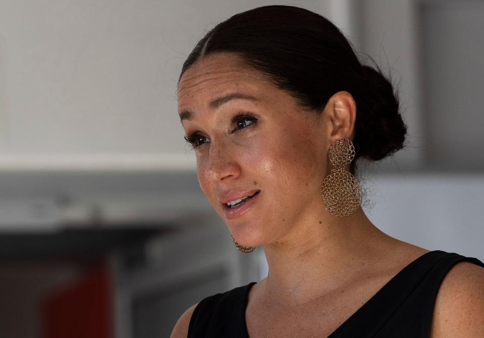 Meghan, Duchess of Sussex gestures as she speaks during a visit to the Woodstock Exchange in Cape Town on September 25, 2019, where she met with female entrepreneurs working in technology. (Photo by DAVID HARRISON / AFP)        (Photo credit should read DAVID HARRISON/AFP/Getty Images)