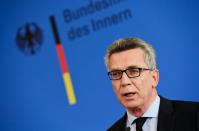 German Interior Minister Thomas de Maiziere addresses a press conference in Berlin, on July 23, 2016