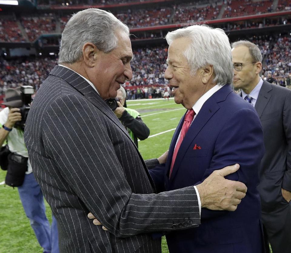 Falcons owner Arthur Blank, left, and Patriots owner Robert Kraft, right, hours before 28-3 became an indelible part of each man’s franchise. (AP)