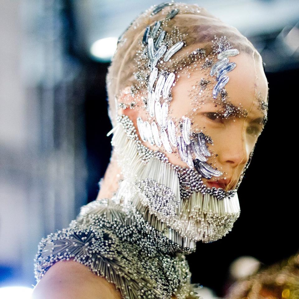 From ethereal white lashes to graphic sci-fi visors, a look back at the romantic beauty ideas on Sarah Burton's Alexander McQueen runway.