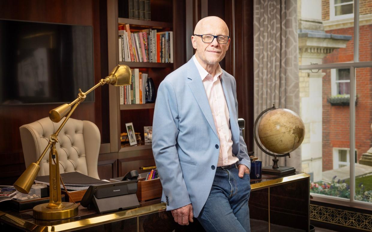 English billionaire businessman, John Caudwell, in his office at his Mayfair home