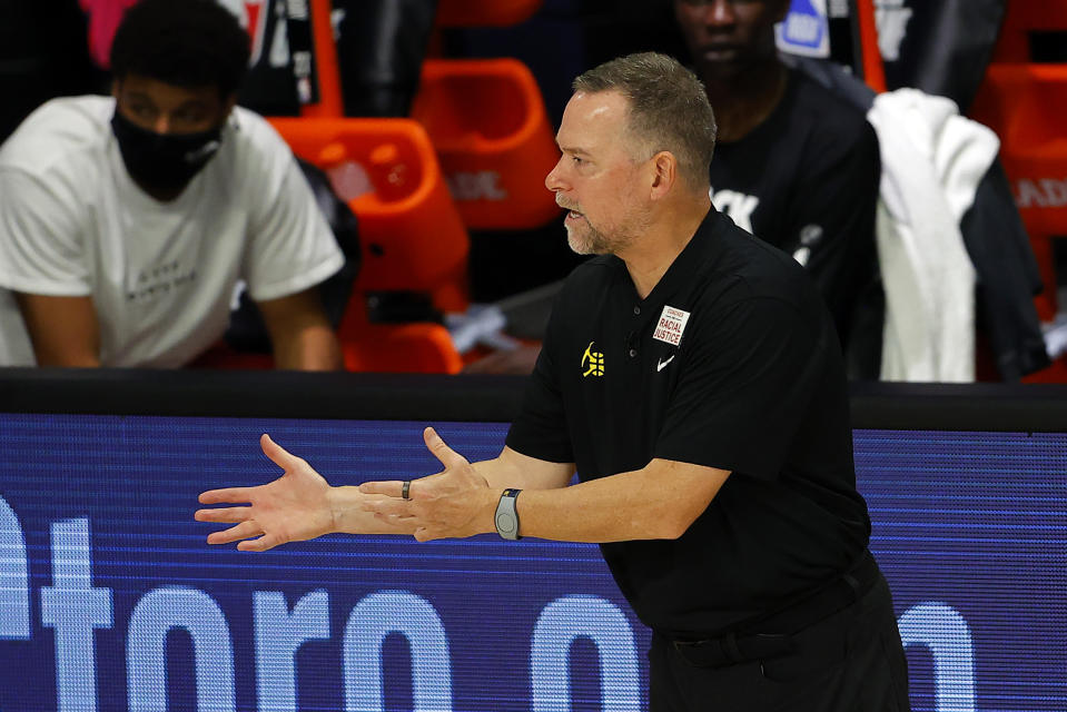 Denver Nuggets head coach Michael Malone reacts against the Miami Heat during an NBA basketball game, Saturday, Aug. 1, 2020, in Lake Buena Vista, Fla. (Kevin C. Cox/Pool Photo via AP)