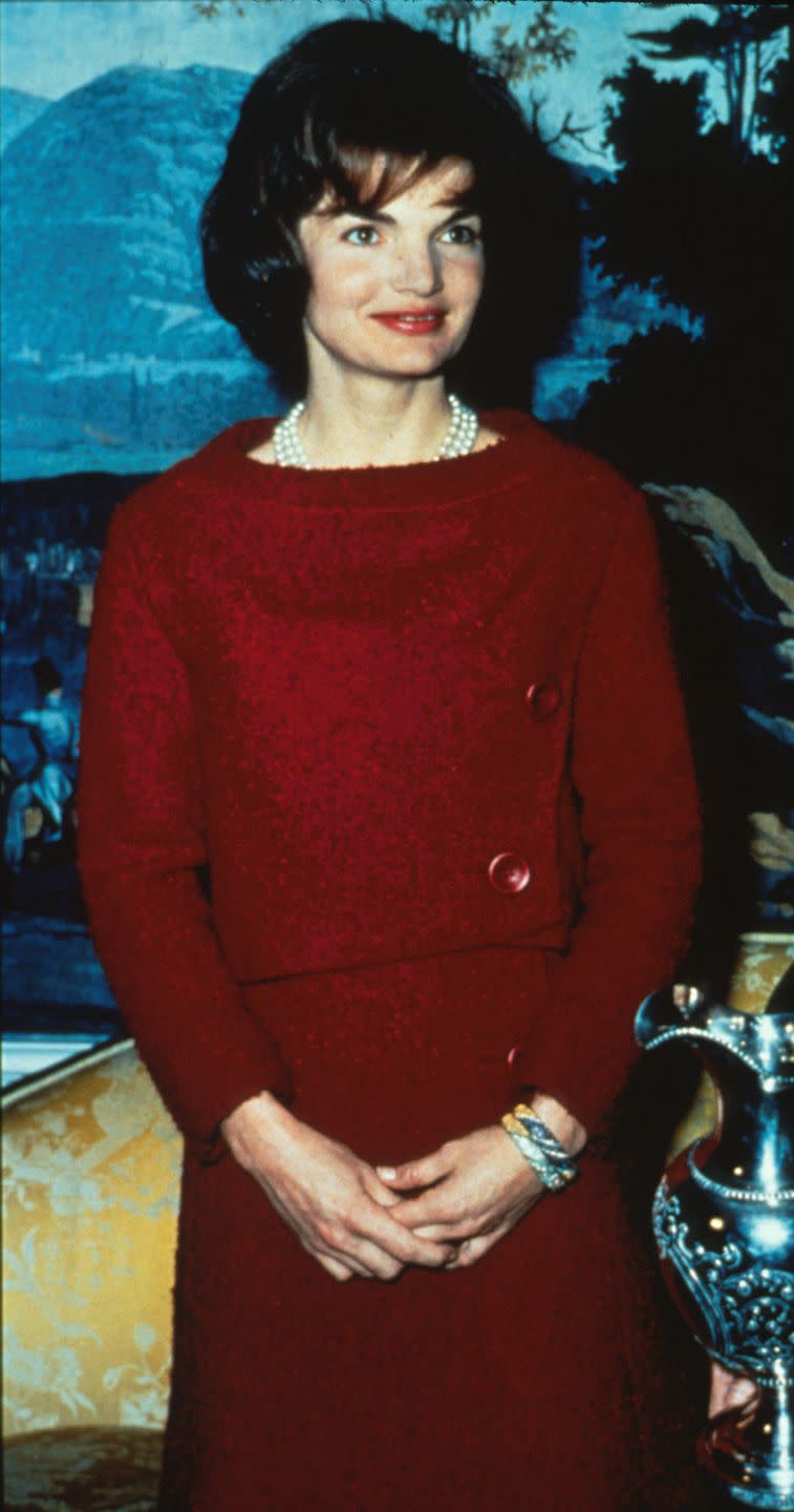 <p>Jacqueline Kennedy looked impeccable as always in a Chez Ninon two-piece dress during a televised Valentine's Day tour of the White House. </p>