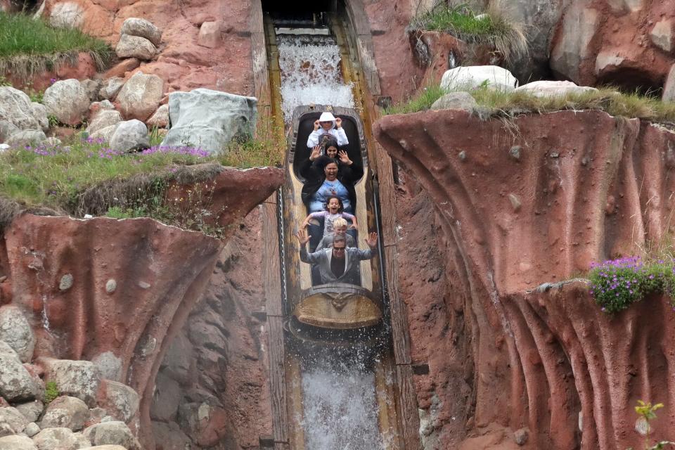 People ride the Splash Mountain attraction at the Disneyland theme park on April 13, 2023 in Anaheim, California.