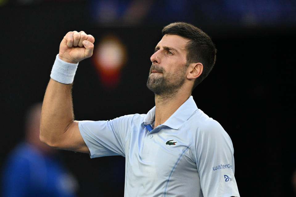 MELBOURNE, AUSTRALIA - JANUARY 23: Novak Djokovic of Serbia celebrates winning his Quarter Final match against Taylor Fritz of US (not seen) at the Australian Open grand slam tennis tournament at Melbourne Park in Melbourne, Australia on January 23, 2024. (Photo by Stringer/Anadolu via Getty Images)