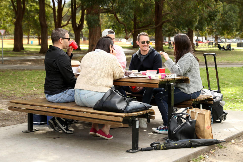 People gather to picnic at Centennial Park in Sydney, Australia. 