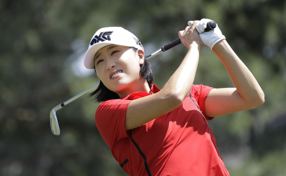 Jennifer Song watches her tee shot on the second hole during the final round of Pure Silk Championship golf tournament at Kingsmill Resort, in Williamsburg, Va., Sunday, May 26, 2019. (AP Photo/Steve Helber)