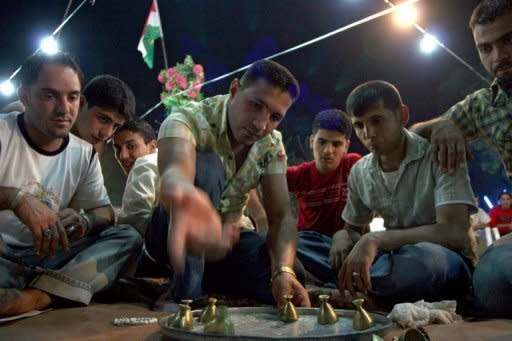 Kurds play a traditional game called 'Mheibe's or 'Rings', mostly played during the holy month of Ramadan, in the nothern Iraqi Kurdish city of Arbil. In the game, which is played by two teams, one team will hide a ring and the other will try to find it