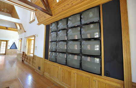 A bank of TV screens are pictured in a room in the train station at Michael Jackson's Neverland Ranch in Los Olivos, California July 3, 2009. REUTERS/Phil Klein