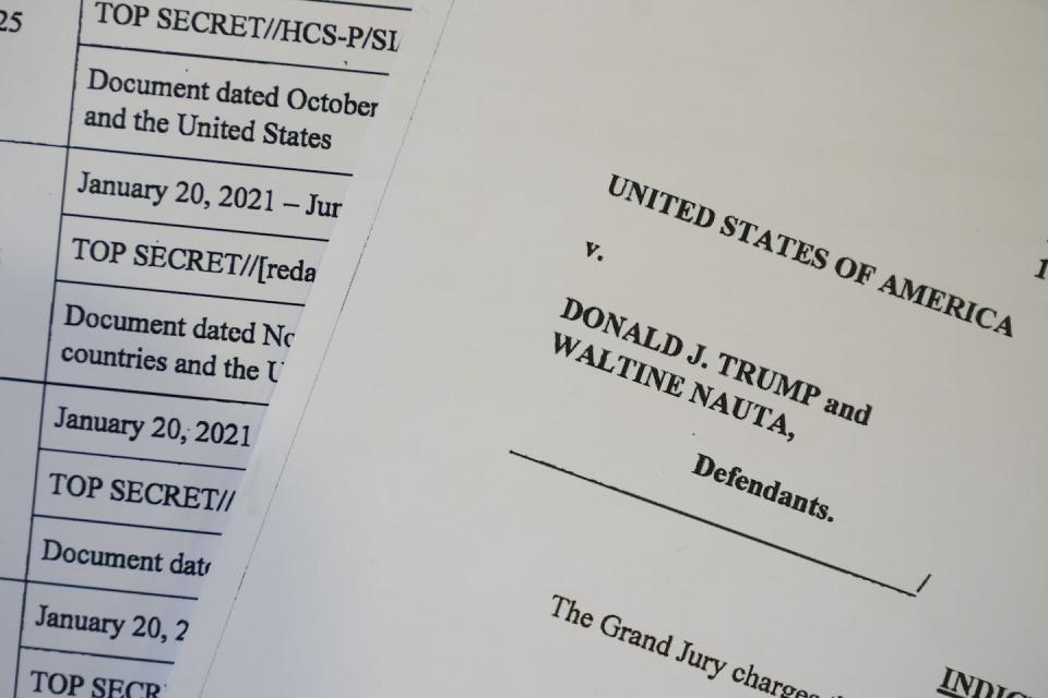 Pages from the unsealed federal indictment of former President Donald Trump on 37 felony counts in the classified documents probe. <a href="https://www.gettyimages.com/detail/news-photo/in-this-photo-illustration-pages-are-viewed-from-the-news-photo/1258567425?adppopup=true" rel="nofollow noopener" target="_blank" data-ylk="slk:Drew Angerer/Getty Images;elm:context_link;itc:0;sec:content-canvas" class="link ">Drew Angerer/Getty Images</a>