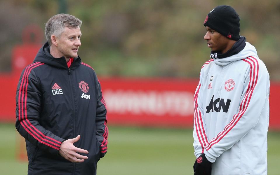 Marcus Rashford (right) has hailed the impact of Ole Gunnar Solskjaer - Manchester United