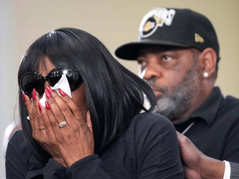 RowVaughn Wells, mother of Tyre Nichols, who died after being beaten by Memphis police officers, cries as she is comforted by Tyre's stepfather Rodney Wells, at a news conference with civil rights Attorney Ben Crump in Memphis, Tenn., Monday, Jan. 23, 2023.