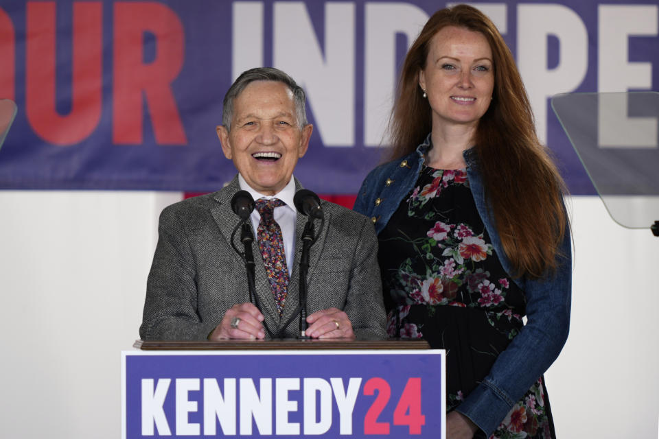 Former Rep. Dennis Kucinich, D-Ohio, left, reacts while speaking with his wife, Elizabeth Kucinich during a campaign event for Presidential candidate Robert F. Kennedy, Jr. at Independence Mall, Monday, Oct. 9, 2023, in Philadelphia. (AP Photo/Matt Rourke)