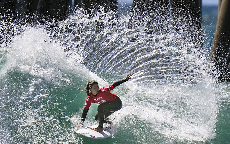 Amuro Tsuzuki, of Japan, competes during the ISA World Surfing Games