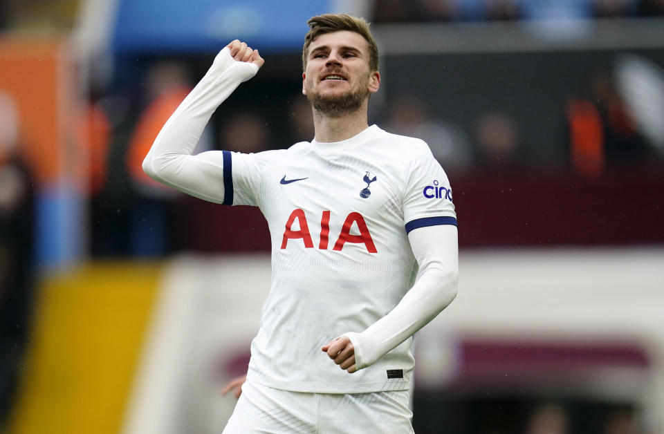 Tottenham Hotspur's Timo Werner celebrates scoring against Aston Villa with teammate Son Heung-min during the English Premier League soccer match at Villa Park, Birmingham, England, Sunday March 10, 2024. (Nick Potts/PA via AP)