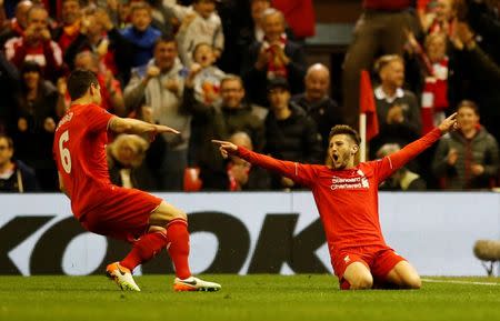 Britain Football Soccer - Liverpool v Villarreal - UEFA Europa League Semi Final Second Leg - Anfield, Liverpool, England - 5/5/16 Adam Lallana celebrates with Dejan Lovren after scoring the third goal for Liverpool Reuters / Phil Noble Livepic