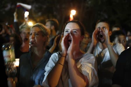 People shout slogans during a protest against supreme court legislation outside the Parliament in Warsaw, Poland, July 21, 2017. REUTERS/Kacper Pempel