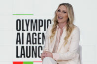 Lindsey Vonn, Olympic Skiing Champion speaks at the International Olympic Committee launch of the Olympic AI Agenda at Lee Valley VeloPark, in London, Friday, April 19, 2024. The IOC will be presenting the envisioned impact that artificial intelligence can deliver for sport, and how the IOC intends to lead on the global implementation of AI within sport. (AP Photo/Kirsty Wigglesworth)