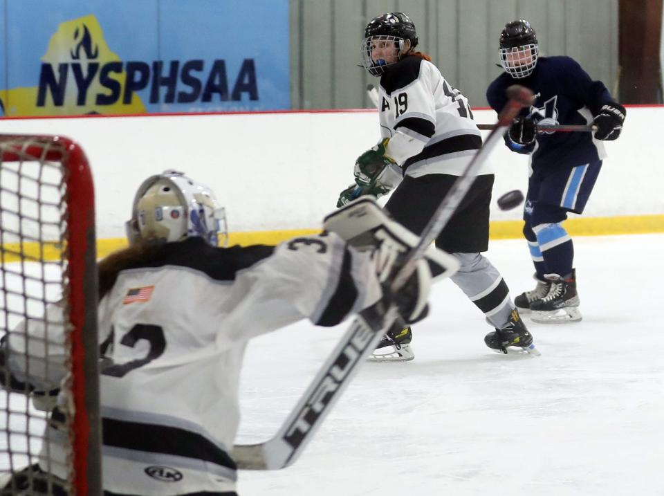 North Avalanche's Katie Anderson (15) fires a shot against the Rockland Rockies during the Section 1 girls hockey championship at the Brewster Ice Arena Feb. 8, 2024. Feb. 7, 2024. The Avalanche won the game 4-0.