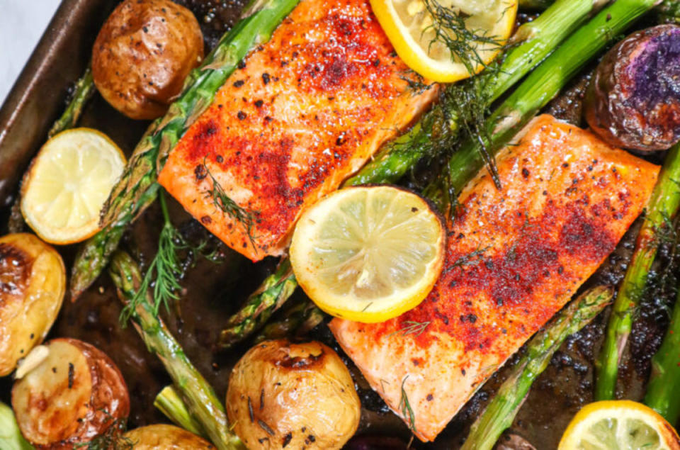 <p>Good Food Baddie</p><p>This easy sheet pan salmon with roasted asparagus, herb-crusted potatoes and luscious avocado crema is perfect for a quick, healthy, filling meal that everyone will enjoy!</p><p><strong>Get the Recipe: </strong><a href="https://goodfoodbaddie.com/easy-sheet-pan-salmon-dish/" rel="nofollow noopener" target="_blank" data-ylk="slk:Easy Sheet Pan Salmon Dish;elm:context_link;itc:0;sec:content-canvas" class="link "><strong>Easy Sheet Pan Salmon Dish</strong></a></p>