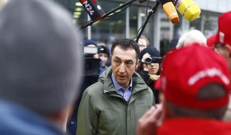 Leader of the Green Party Cem Ozdemir arrives at the CDU headquarters for exploratory talks about forming a new coalition government in Berlin, Germany, November 18, 2017. REUTERS/Hannibal Hanschke