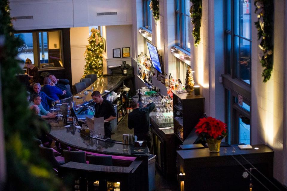 In this Tribune file photo, Cafe Navarre in downtown South Bend is decorated for the holidays in 2018. The restaurant will be open this Christmas Eve but closed Christmas Day.