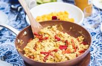 <p>If you’re trying to cut back on animal products, but you just can’t give up scrambled eggs, we’re here to introduce you to tofu scramble. Tofu, a high-protein soy product, is crumbled into pieces and cooked on a skillet with spices and veggies of your choosing. This recipe uses tomatoes, garlic, peppers and onion for a <a href="https://www.thedailymeal.com/cook/best-mexican-recipes?referrer=yahoo&category=beauty_food&include_utm=1&utm_medium=referral&utm_source=yahoo&utm_campaign=feed" rel="nofollow noopener" target="_blank" data-ylk="slk:Mexican-inspired take;elm:context_link;itc:0;sec:content-canvas" class="link ">Mexican-inspired take</a> on the breakfast option.</p> <p><a href="https://www.thedailymeal.com/mexican-tofu-scramble-recipe?referrer=yahoo&category=beauty_food&include_utm=1&utm_medium=referral&utm_source=yahoo&utm_campaign=feed" rel="nofollow noopener" target="_blank" data-ylk="slk:For the Mexican Tofu Scramble recipe, click here.;elm:context_link;itc:0;sec:content-canvas" class="link ">For the Mexican Tofu Scramble recipe, click here.</a></p>