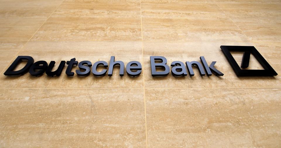 A logo is pictured outside the offices of German bank Deutsche Bank in central London on July 8, 2019. - Germany's biggest lender Deutsche Bank said Sunday it would cut 18,000 jobs by 2022, as the former leading light of the country's financial sector looks to escape years of turmoil. With almost 8,000 staff, Deutsche Bank is one of the biggest employers in the City of London. (Photo by Tolga AKMEN / AFP)        (Photo credit should read TOLGA AKMEN/AFP/Getty Images)