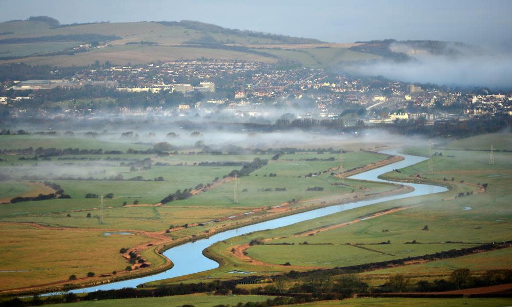 Misty morning over the Ouse river and Lewes, the county town of East Sussex, UK.