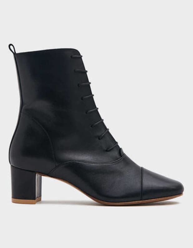 By Far Lada Leather Boot in Black, $509, <a href="https://rstyle.me/+dz0kXTICDFKYz6M3m3Ar4A" rel="nofollow noopener" target="_blank" data-ylk="slk:available here;elm:context_link;itc:0;sec:content-canvas" class="link ">available here</a>.