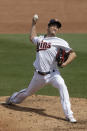 Minnesota Twins starting pitcher Kenta Maeda works in the second inning of a spring training baseball game against the Boston Red Sox Monday, Feb. 24, 2020, in Fort Myers, Fla. (AP Photo/John Bazemore)