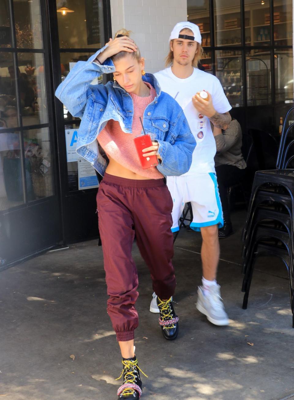 <p><strong>Who: </strong>Hailey Baldwin</p><p><strong>Affordable Fashion Find: </strong><strong>Aritzia </strong>sweater, $110, <a rel="nofollow noopener" href="https://www.aritzia.com/us/en/product/lolan-sweater/69679.html?dwvar_69679_color=13263" target="_blank" data-ylk="slk:aritzia.com;elm:context_link;itc:0;sec:content-canvas" class="link ">aritzia.com</a>.</p><p><a rel="nofollow noopener" href="https://www.aritzia.com/us/en/product/lolan-sweater/69679.html?dwvar_69679_color=13263" target="_blank" data-ylk="slk:SHOP NOW;elm:context_link;itc:0;sec:content-canvas" class="link ">SHOP NOW</a></p><p><strong>Aritzia</strong> track pants, $88, <a rel="nofollow noopener" href="https://www.aritzia.com/us/en/product/boyfriend-track-pant/69736.html?dwvar_69736_color=11693" target="_blank" data-ylk="slk:aritzia.com;elm:context_link;itc:0;sec:content-canvas" class="link ">aritzia.com</a>.</p><p><a rel="nofollow noopener" href="https://www.aritzia.com/us/en/product/boyfriend-track-pant/69736.html?dwvar_69736_color=11693" target="_blank" data-ylk="slk:SHOP NOW;elm:context_link;itc:0;sec:content-canvas" class="link ">SHOP NOW</a></p><p><strong>Why We Love It:</strong> The model unexpectedly styled a cropped sweater with a pair of swishy track pants for a look that's not only travel-friendly, but also affordable. </p>