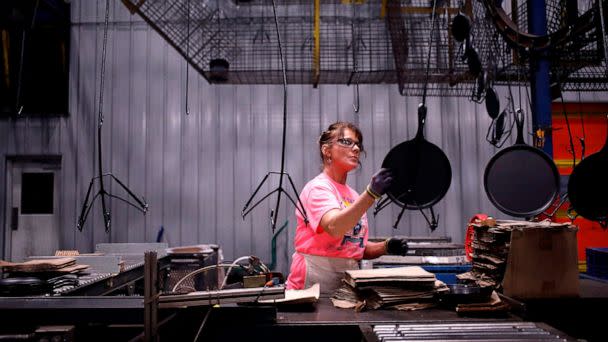 PHOTO: A worker packages cast iron cookware at the Lodge Manufacturing Co. factory in South Pittsburg, Tennessee, March 7, 2022. (Luke Sharrett/Bloomberg via Getty Images, FILE)