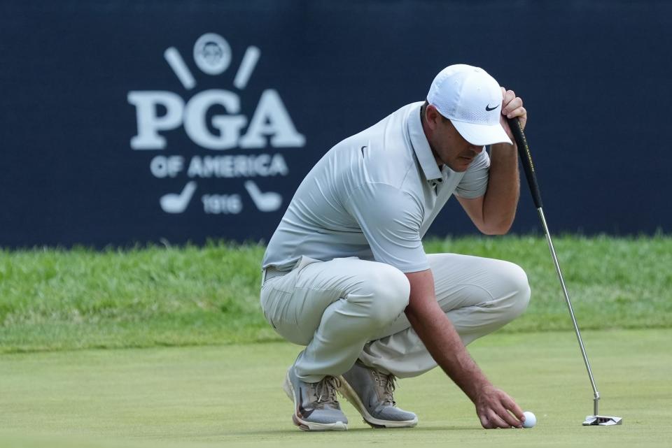 Brooks Koepka lines up his putt on the 15th green during the final round of the PGA Championship at Valhalla Golf Club on Sunday, May 19, 2024.