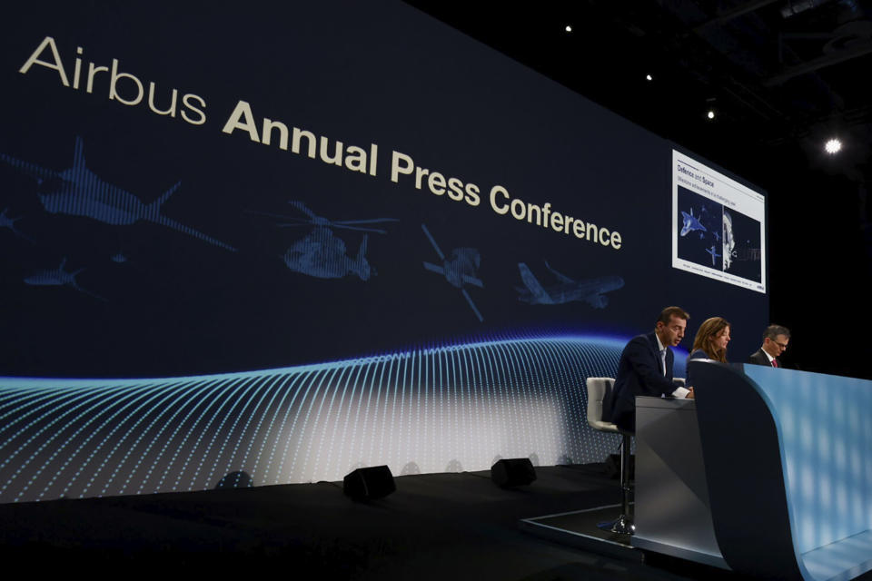Airbus Chief Executive Officer Guillaume Faury, left, head of Airbus Communications and Corporate Affair Julie Kitcher, center, and Airbus CFO Dominik Asam attend Airbus' Annual Press Conference, Thursday, Feb. 16, 2023 in Toulouse, southwestern France. Airbus is urging stepped-up European cooperation to ensure the continent's security and future access to space, after a year that saw the planemaker suffer fallout from Russia's war in Ukraine and the crash of a multibillion-euro European rocket. The company on Thursday reported a record overall 2022 profit of 4.25 billion euros. (AP Photo/Frederic Scheiber)
