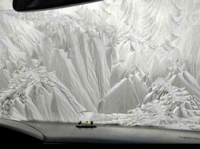 windshield looks like it's got a mountain landscape drawn on it