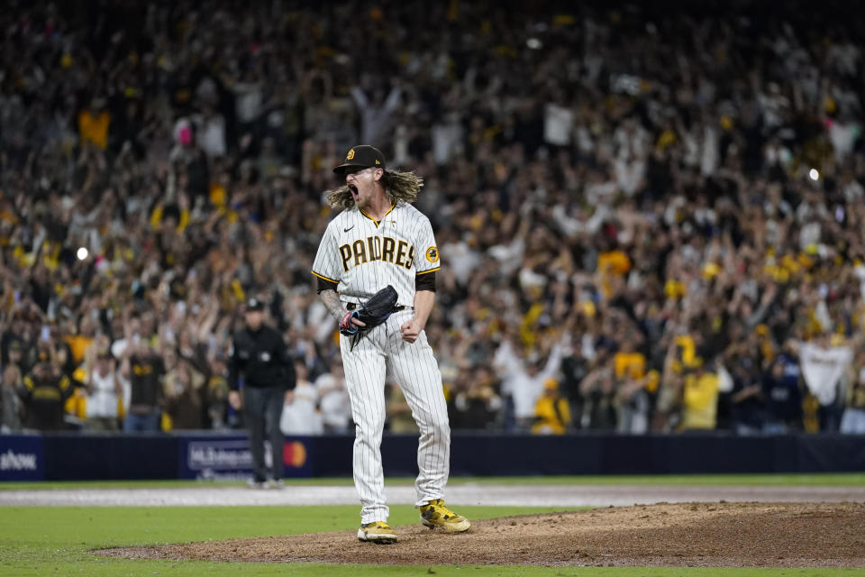 San Diego Padres relief pitcher Josh Hader celebrates after the Padres defeated the Los Angeles Dodgers 5-3 in Game 4 of a baseball NL Division Series, Saturday, Oct. 15, 2022, in San Diego. (AP Photo/Ashley Landis)