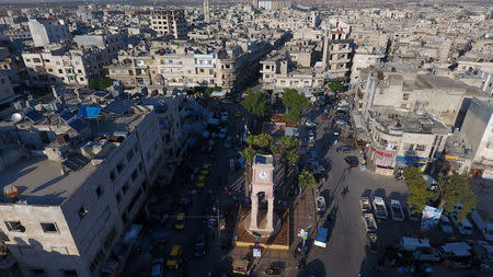 FILE PHOTO:A general view taken with a drone shows the Clock Tower of the rebel-held Idlib city, Syria June 8, 2017. Picture taken June 8, 2017. REUTERS/Ammar Abdullah/File Photo