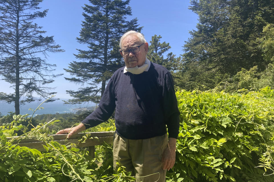 Leonard Hayflick, the scientist who discovered cellular senescence in 1960, stands outside his home in The Sea Ranch, Calif., on May 23, 2022. At 94, he's a professor of anatomy at the University of California, San Francisco, and continues to write, present and speak on the topic. (AP Photo/Laura Ungar)