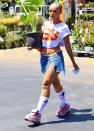 <p>Doja Cat totes her new purchase on Aug. 17 after a shopping trip in Calabasas, California. </p>